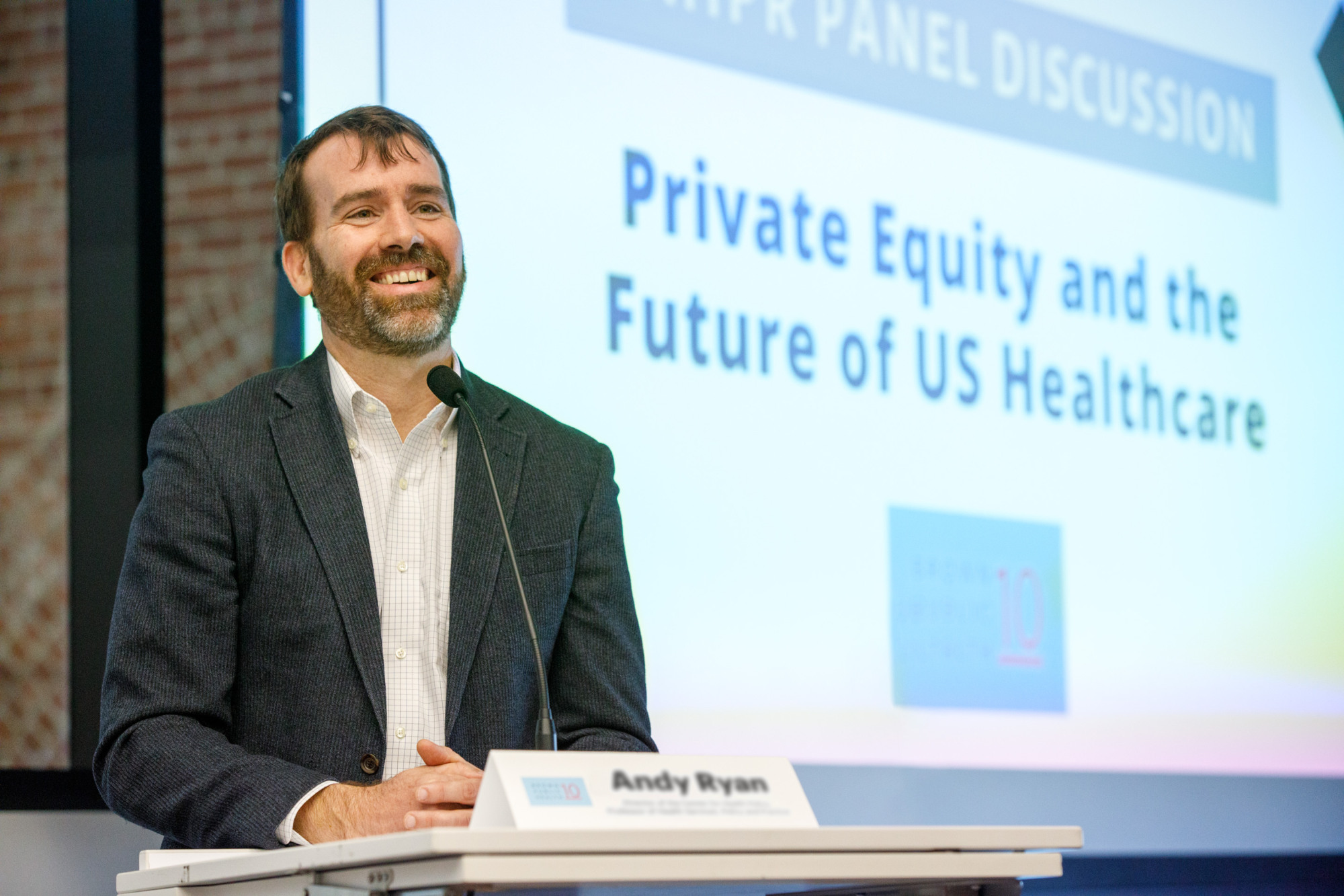 Andy Ryan at launch event podium