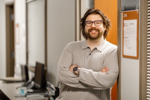 Photo of Ph.d. student, Garrett Stang, in CAAS lab