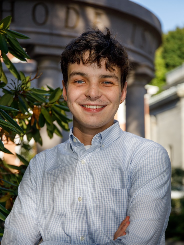 man smiles at camera