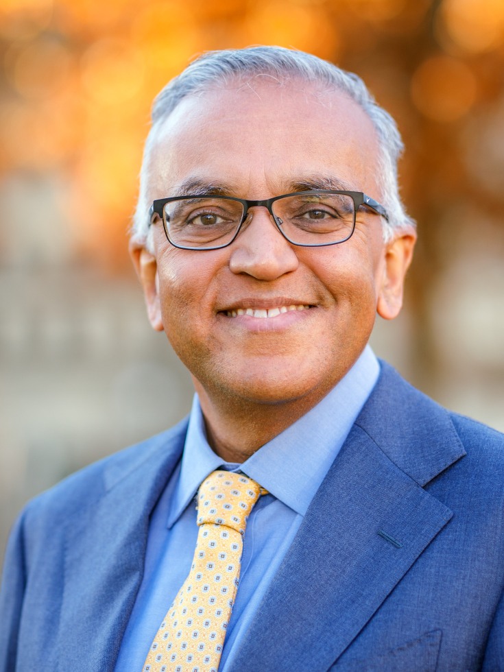 Ashish Jha smiles