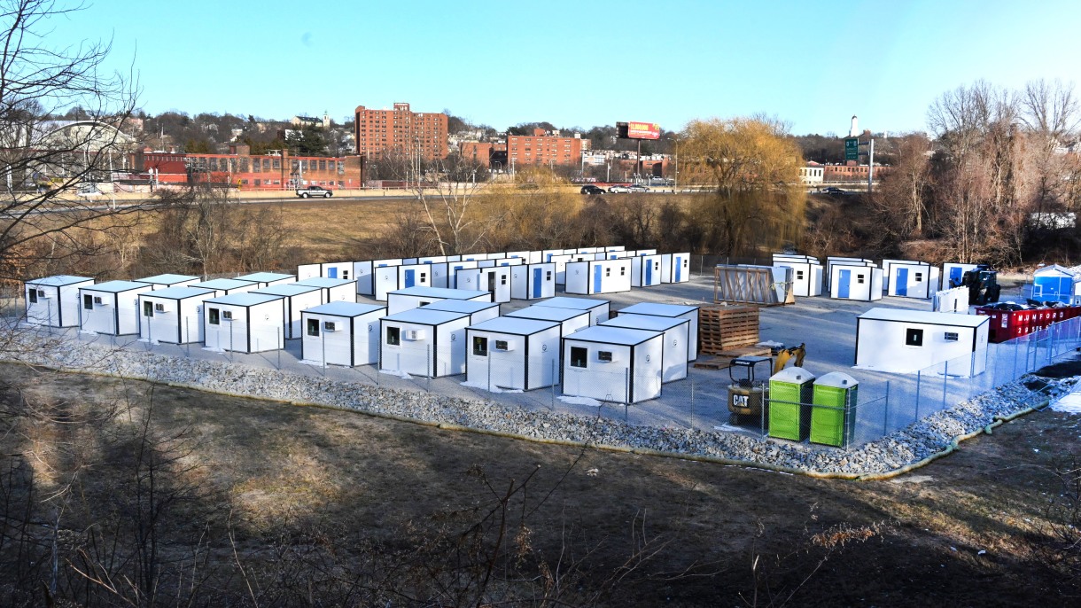 shelter housing sitting unoccupied in a lot