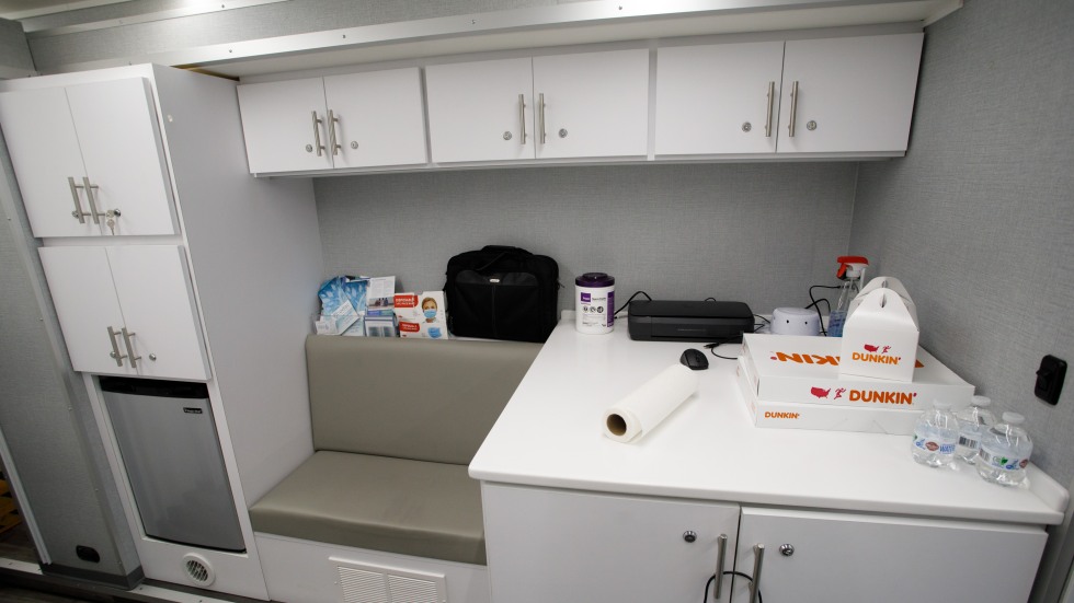 desk and cabinets in van interior