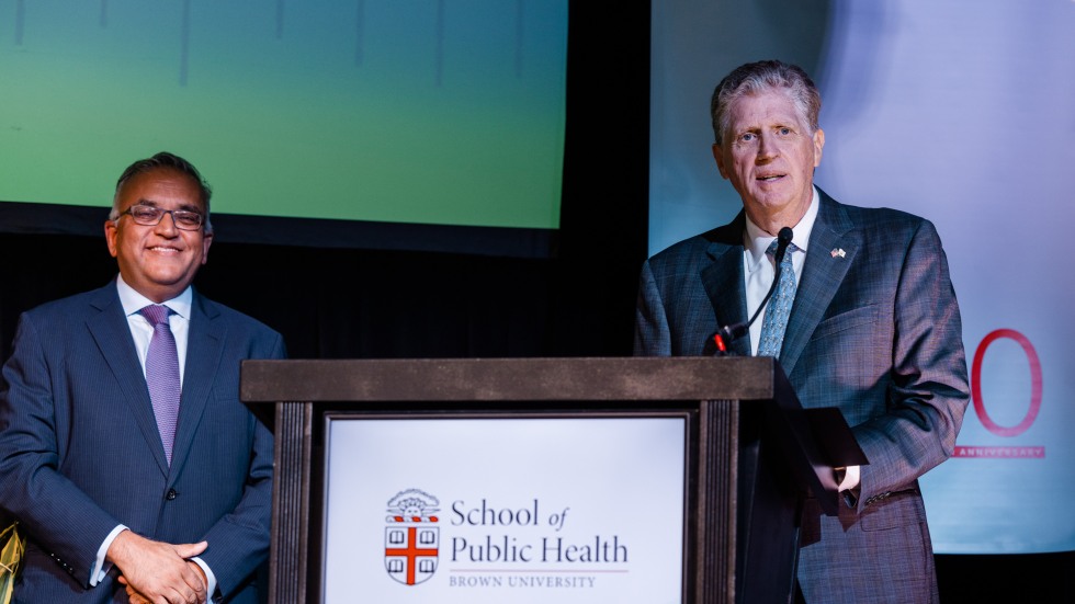 Jha and Governor McKee
