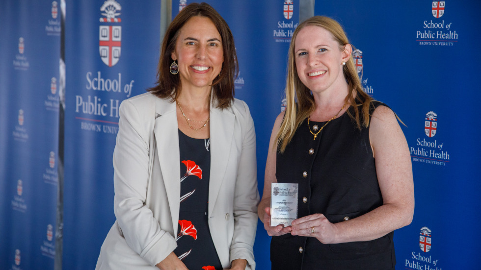 Dean Francesca Beaudoin awards Ashley Stacy-Boddapati, MPH ’25 with the inaugural Emerging Leader Award.